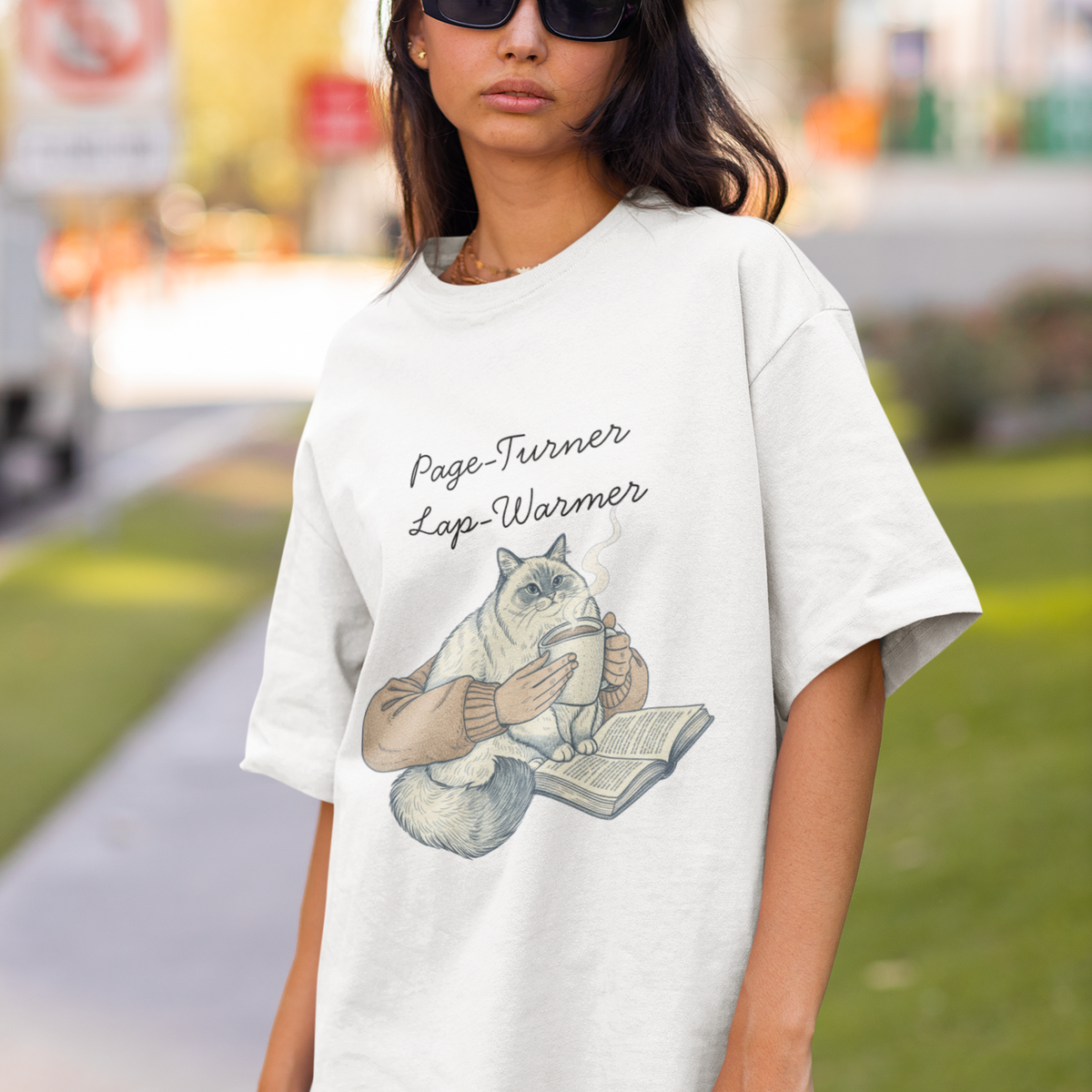 Page-Turner Lap-Warmer Cat T-Shirt – Bookish Cozy Humor by Electrik Land