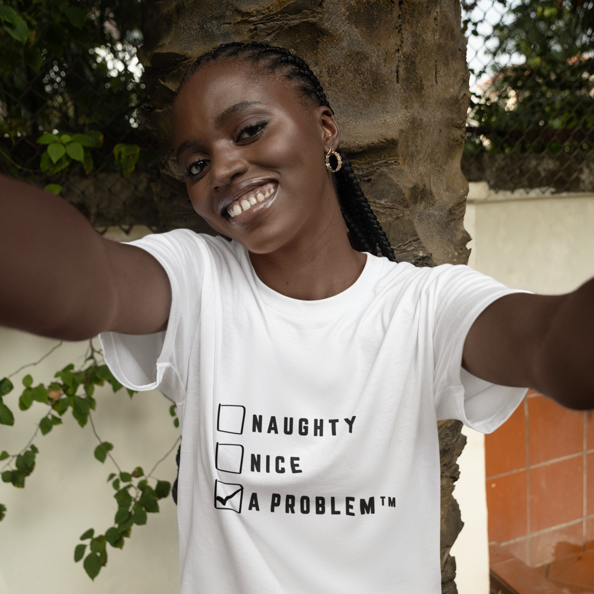 A Problem T-Shirt with Naughty Nice Checklist by Electrik Land.